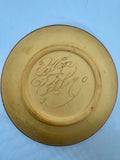 Decorative plate by Pilliga Pottery features a hand-painted Blue Wren design